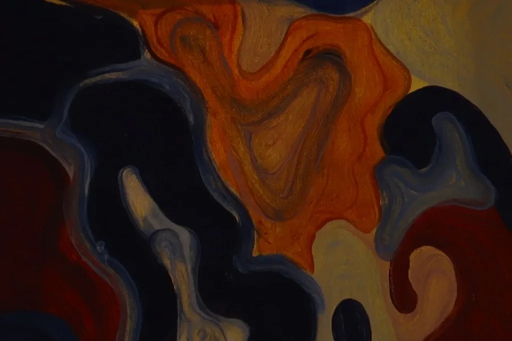 An abstract composition of flowing dark blue and orange shapes with soft edges, resembling movement through water or smoke.